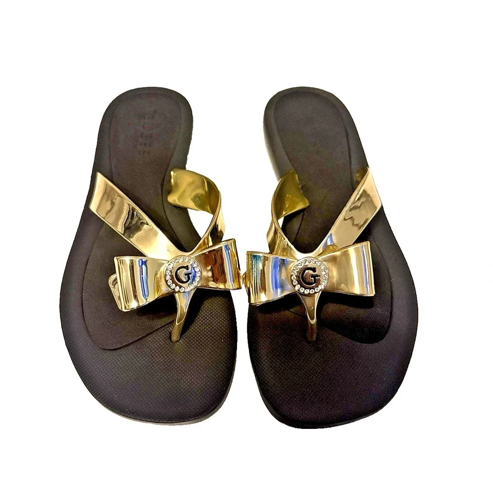 Guess Women's Tutu Embellished Bow Flip Flops Black & Gold Size 6M